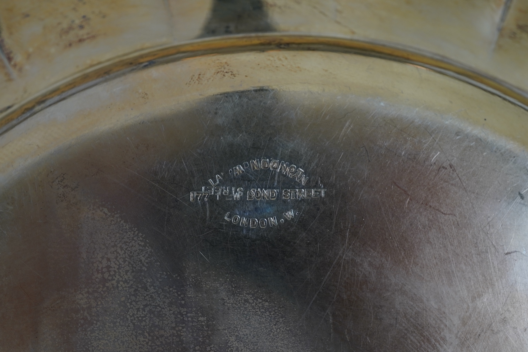 A set of twelve George V silver gilt side plates by J.S. Harman & Co